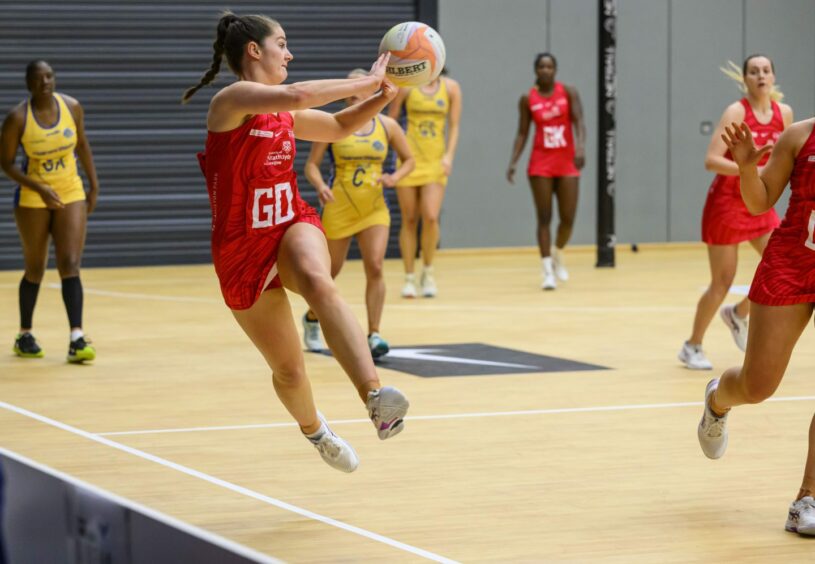 Sirens player Emily Nicholl in action. 