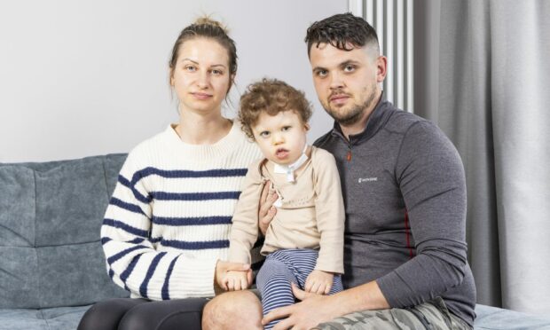 Max and Kasia with son Troy, who requires round-the-clock care.