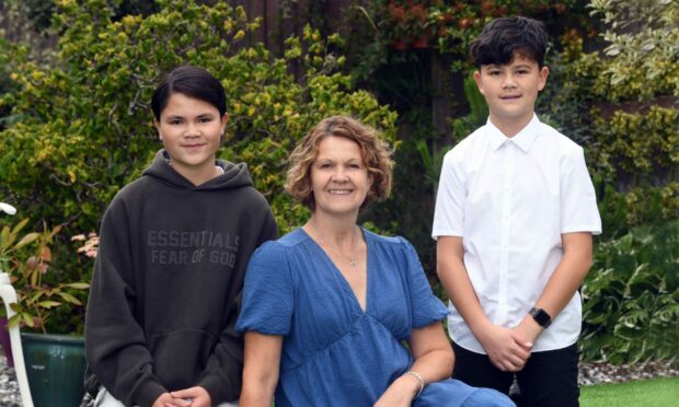 Anne Maclean-Chang, from Larbert, with her sons Nathan and Ollie.