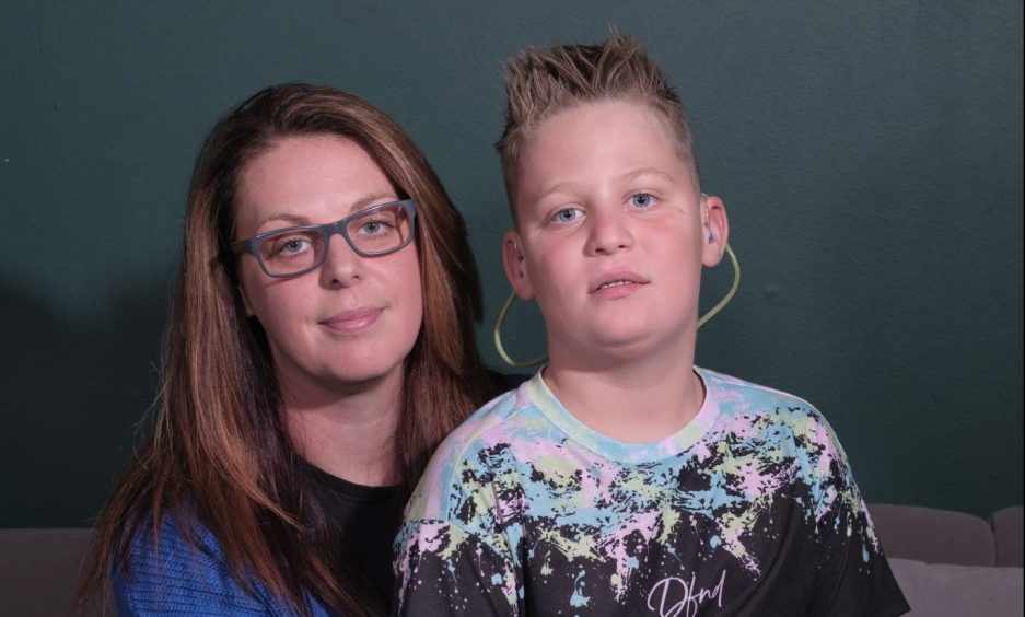 Lenka Liptak and her son Alex, 9, who was misdiagnosed.