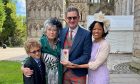 Chicago Scots President Gus Noble, centre, after receiving his OBE in Edinburgh with son Bobby, mum Joan and wife Aisha.