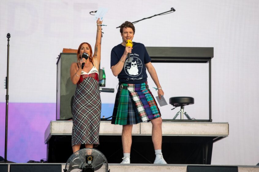 Arielle Free and Greg James introduce Lewis Capaldi at the festival. 