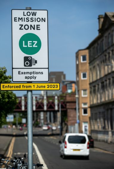 Low Emission Zone (LEZ) signs in Glasgow city centre.