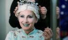 Claire Dargo, who plays the Snow Queen, getting ready with hair and makeup in her dressing room.