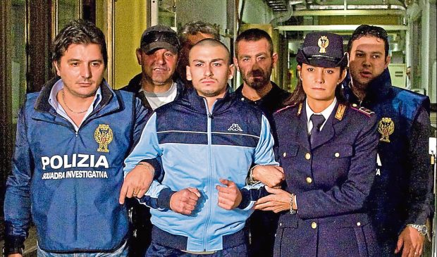 Camorra mafia killer Catello Romano as he is arrested in Naples in 2009.