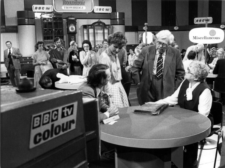 Filming the Antiques Roadshow, which began in 1979.