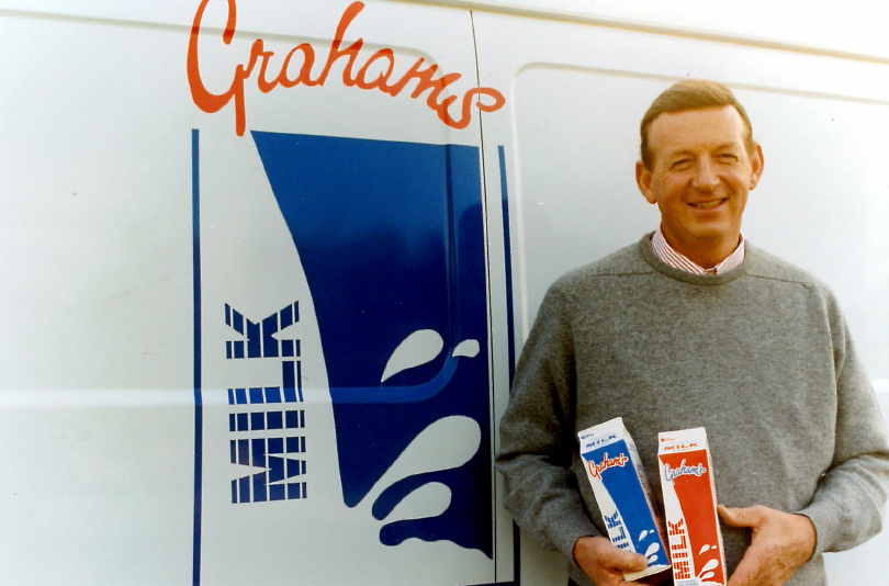 Robert with Grahams milk cartons.