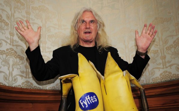 Billy Connolly with his Big Banana Boots at The City Chambers where he received the Freedom of the City of Glasgow in 2010.