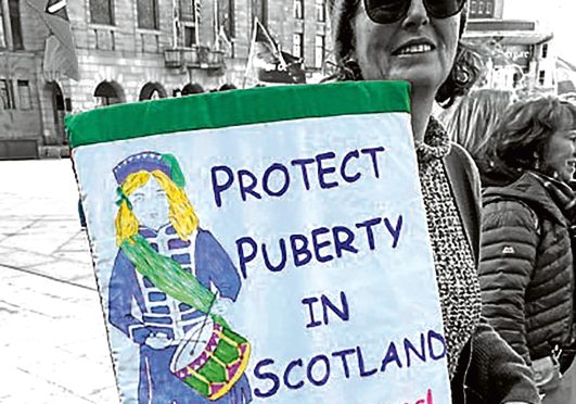 Anti-puberty blocker campaigners in Dundee yesterday.