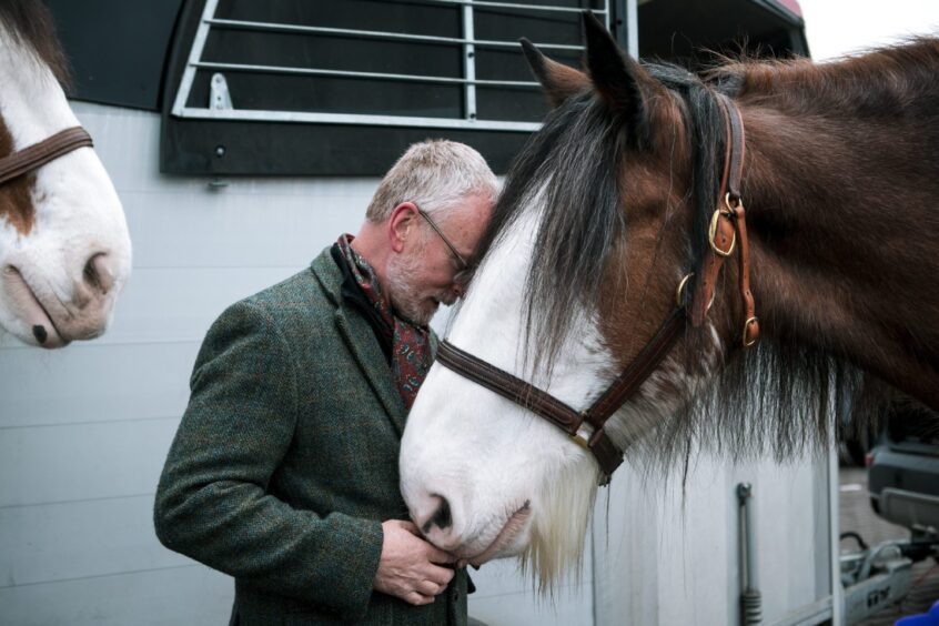 Andy with one of the horses.