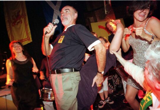 Sean Connery has a ball at the party in Paris before the World Cup in 1998.