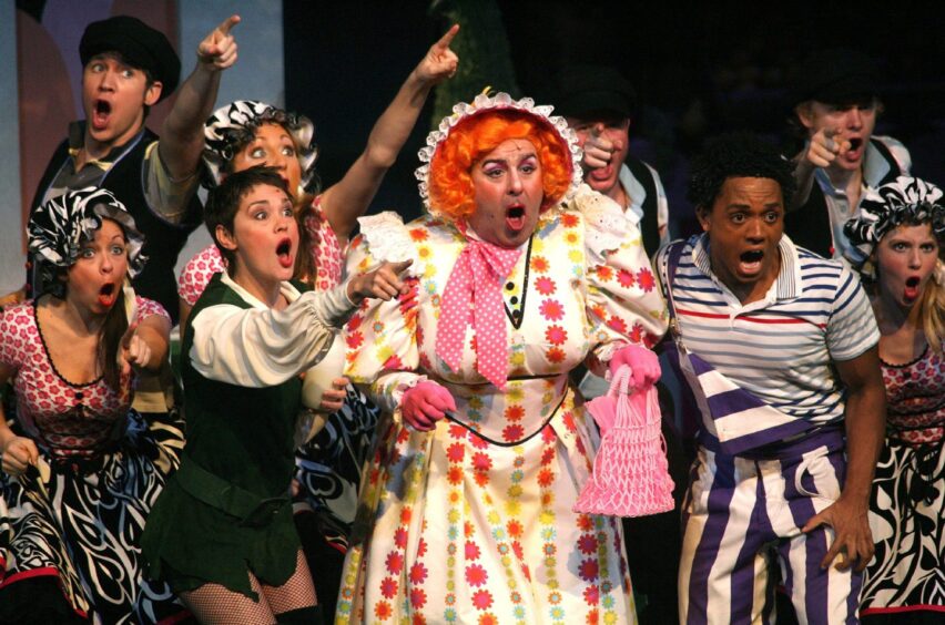 Andy Gray as Dame Dolly, centre, in Jack And The Beanstalk at the Barbican Theatre, London, in 2007
