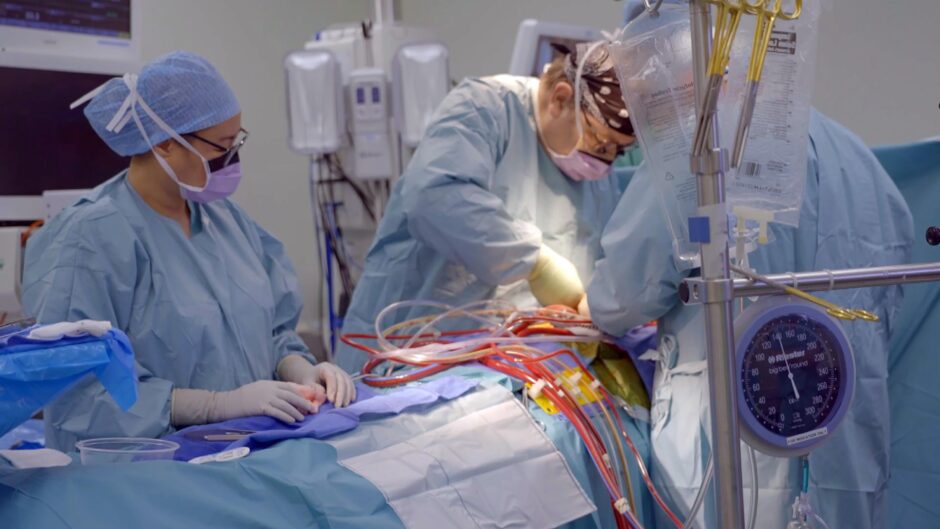 Surgeon Chuck McLean and Lyrae Lopez during patient Margo's life-saving procedure.