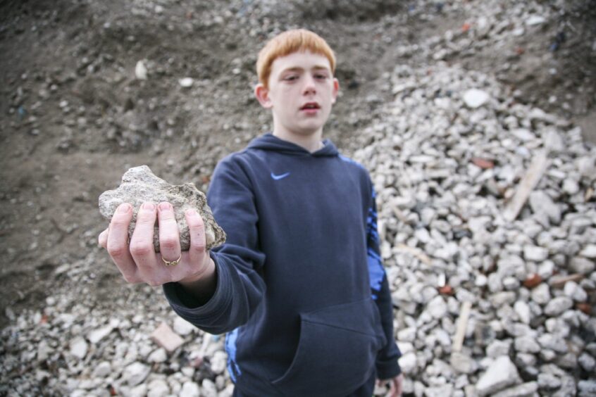 Photos from the exhibition show Tony McDermott, pictured in 2014, who then took up a trainee employment scheme that was funded by the Commonwealth Games.