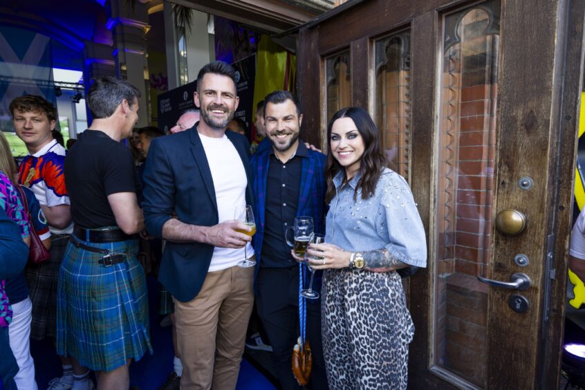 Former Rangers footballer Steven Thompson and ex-Ibrox star Richard Foster with his wife, Amy MacDonald.