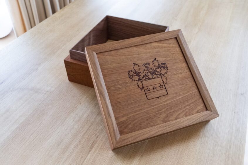 A memory box with family crest.