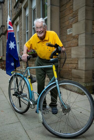 Douglas with his bike.