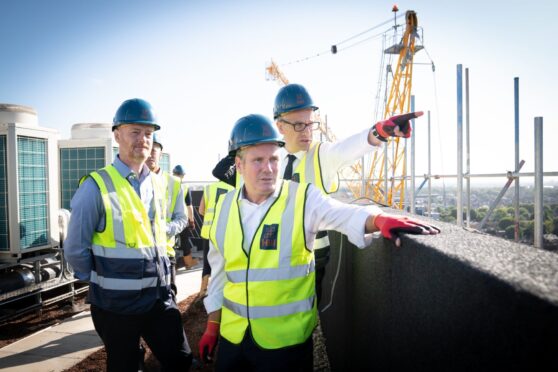 Sir Keir Starmer during a visit to a housing development to see how families will save money on their energy bills through the installation of heat saving measures.  Image: PA