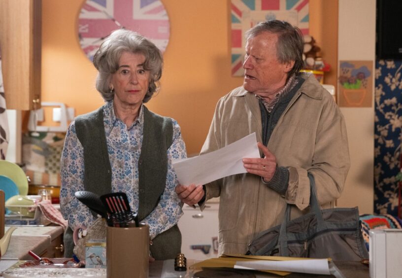 Evelyn Plummer, as played by Maureen Lipman, alongside David Neilson's Roy Cropper on Coronation Street. 