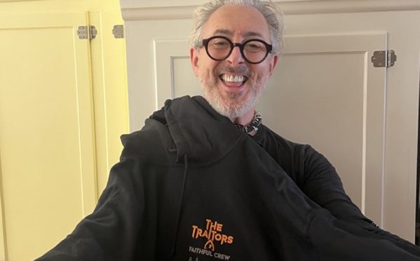 Alan Cumming in Traitors hoodie