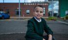 Caleb Stirrat is all smiles on his first day in Primary 4 at St Eunan’s Primary School in Clydebank.