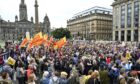 Demonstrators during an anti-racism protest organised by Stand Up to Racism, in George Square, Glasgow.