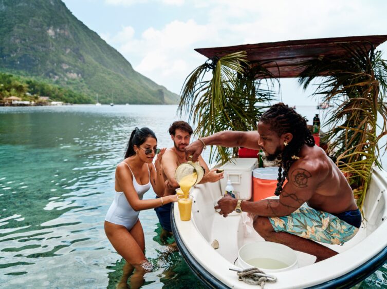 Enjoying cocktails from a local boat.