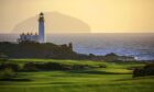 Turnberry Lighthouse and Ailsa Craig viewed from Trump Turnberry hotel.