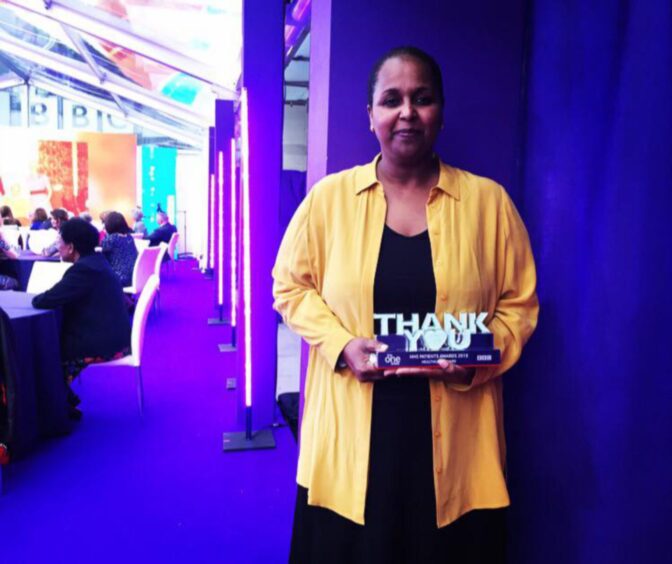 Elneil receives an award on The One Show in May 2018.