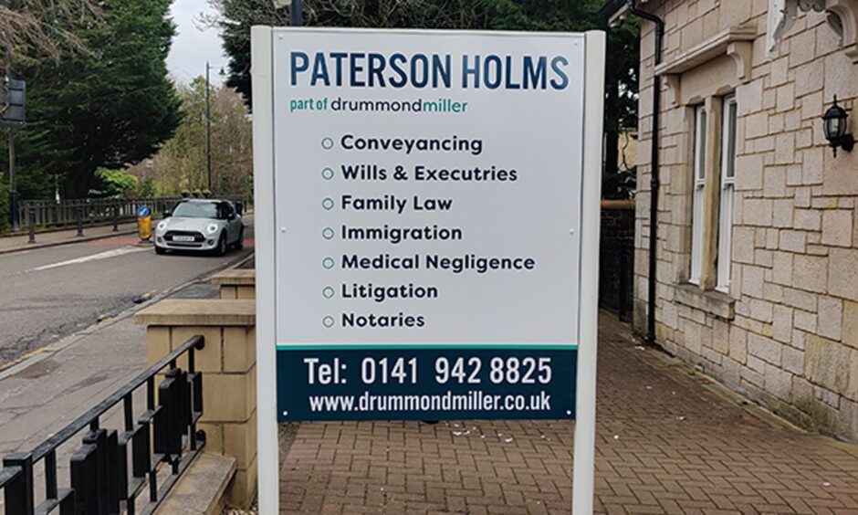 sign outside Drummond Miller's office showing its services