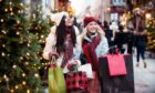 two women explore Belfast after going on bus trips to Christmas markets