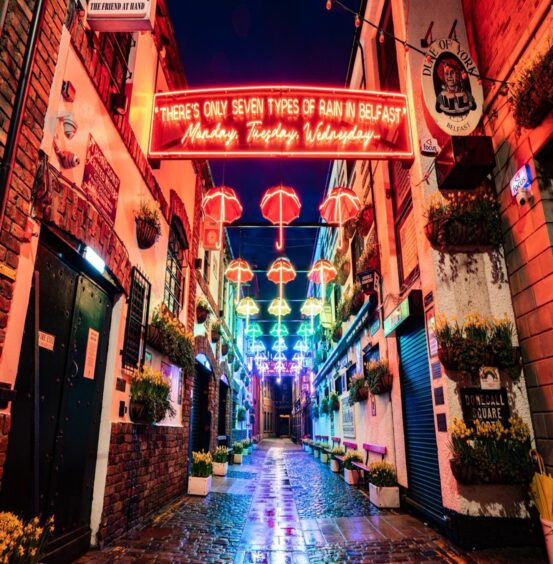 colourfully lit street in Belfast