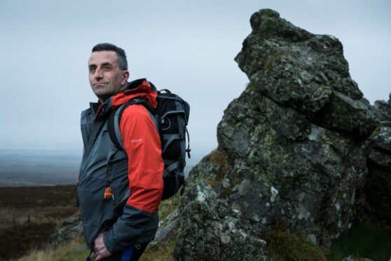 Donald McInnes climbing The Whangie, in the Kilpatrick Hills outside Glasgow, as he starts his return to his beloved Scottish peaks.