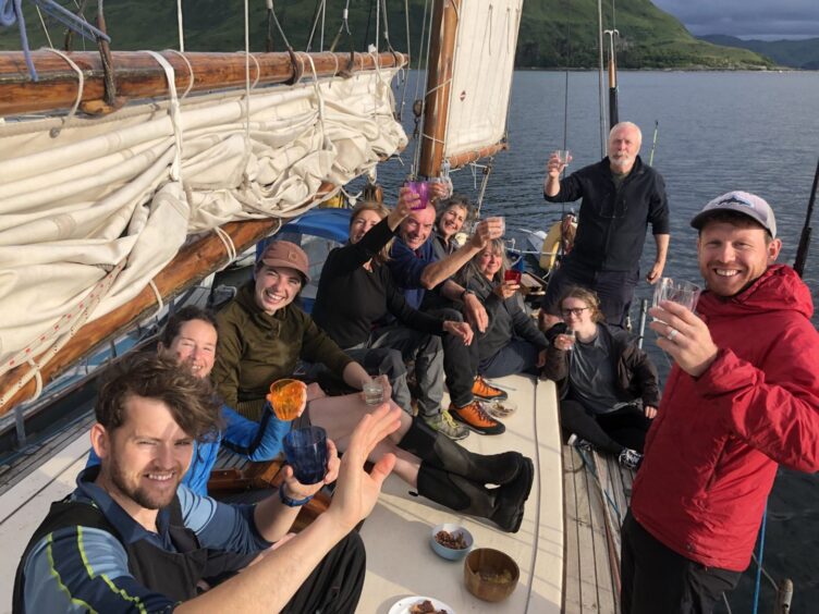 The Law family and friends on the boat.