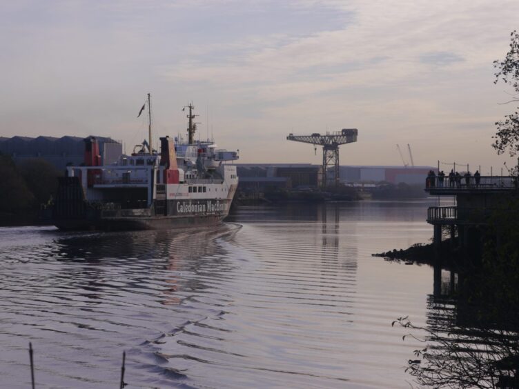 People gather to watch Hebridean Isles sail past Braehead.