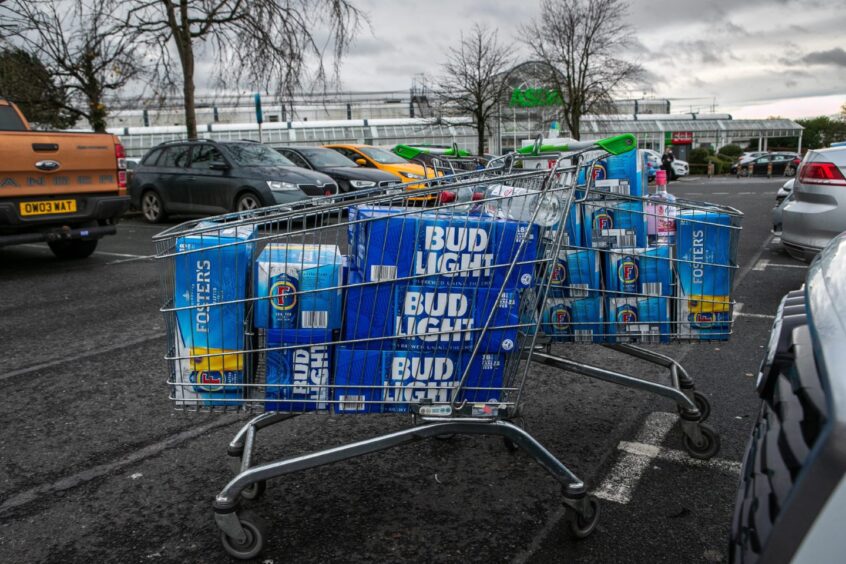 A Scottish shopper's trolley full of alcohol bought from supermarkets in Carlisle.