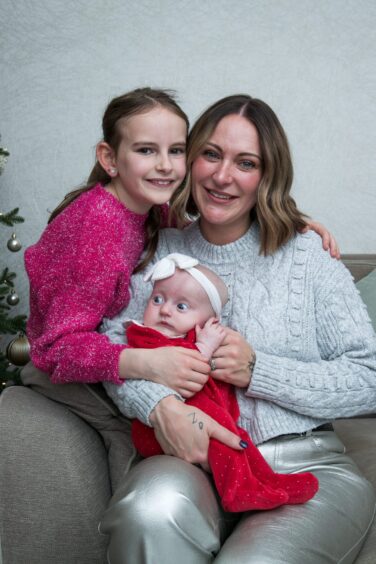 Proud mum Danielle Greenan with daughters Zara, nine, and baby Remi at their home in Winchburgh, West Lothian.