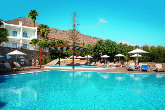 Finding a sun lounger at the Elounda Breeze is done with ease.