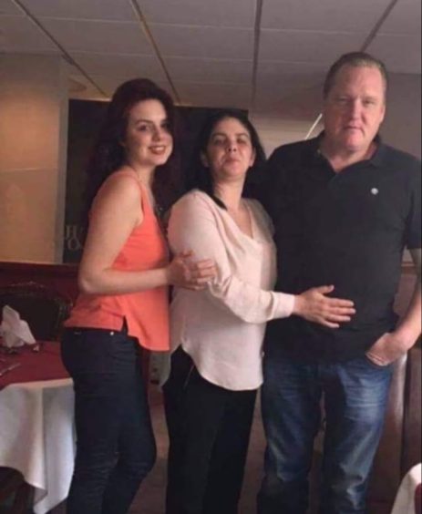 Demi with her mum and dad.