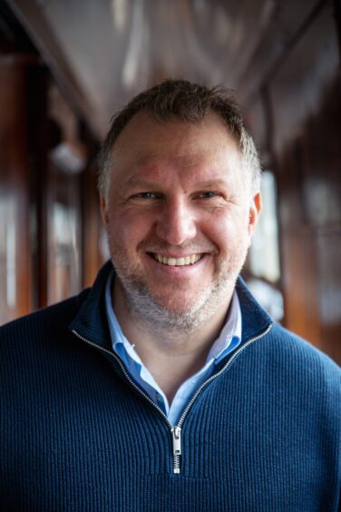 Chairman Andrew Wells.