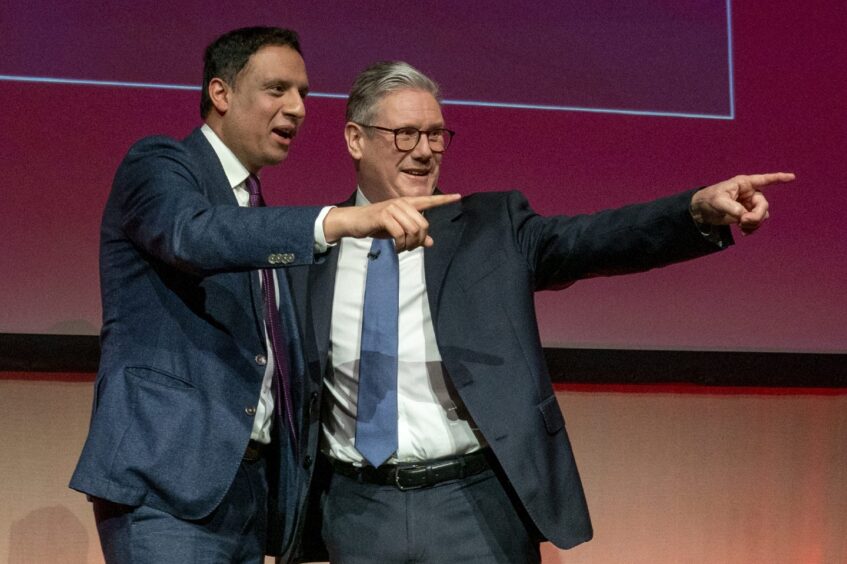 Sir Keir Starmer with Anas Sarwar after delivering his speech during the Scottish Labour Party conference in Glasgow.