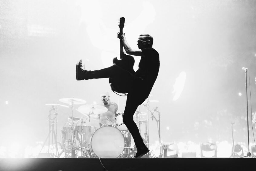Bryan Adams on stage.