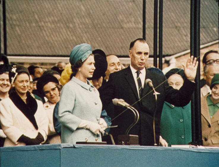 The Queen launches QE2.