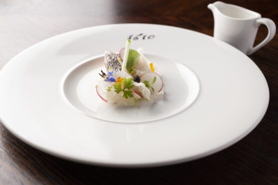 a beautifully plated dish at the globe inn dumfries