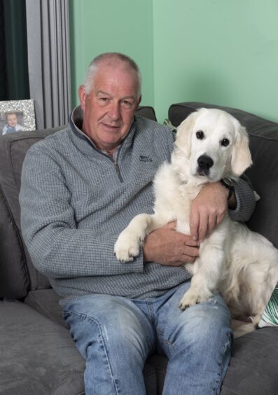 Rab Thomson, with dog Maisy, from Alva.