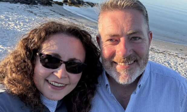 Iain Trayner with wife Emma Jane, a cardiac nurse, at home in Stornoway.