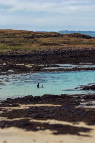 Swimming at Port na Ba beach.