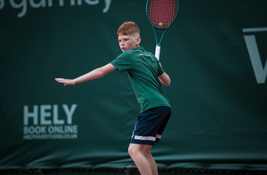 Illia Snaksarov playing tennis at Glasgow’s Western Tennis Club.