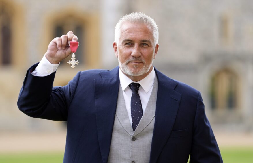 Paul with his MBE in 2024.