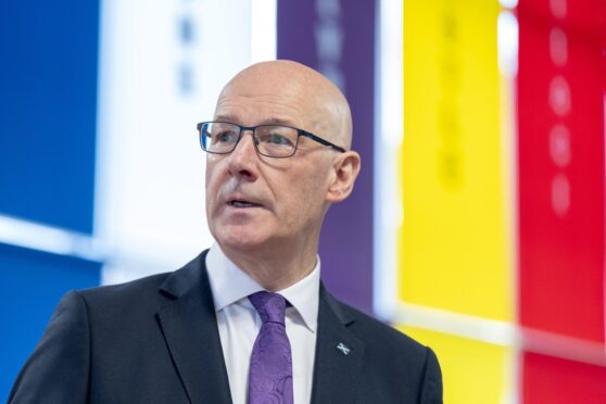First Minister John Swinney.